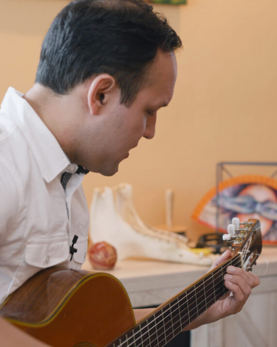 Richard playing guitar