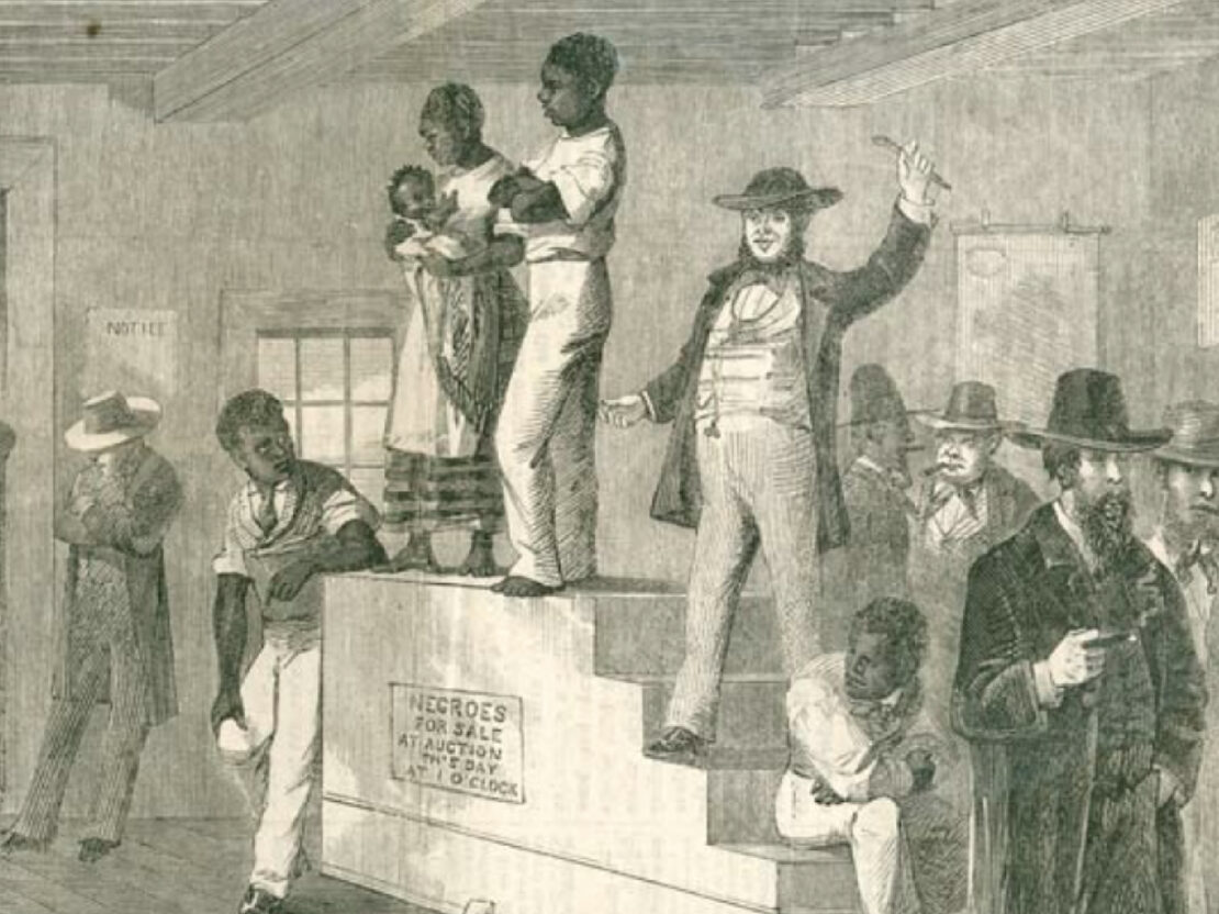 A black and white illustration showing two adults and one baby standing on a platform indoors. On the stairs connected to the platform a man stands with his arm raised.