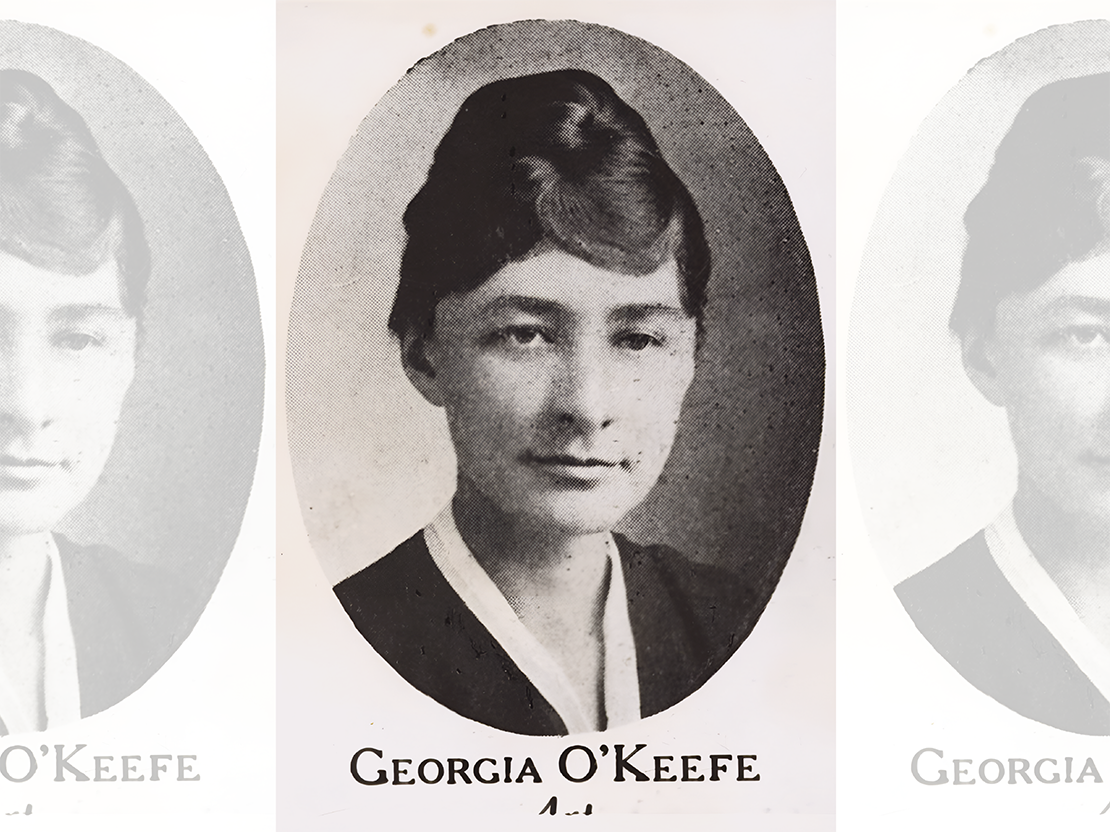 A black and white portrait photo of Georgia O'Keeffe. Her dark hair is tied up.